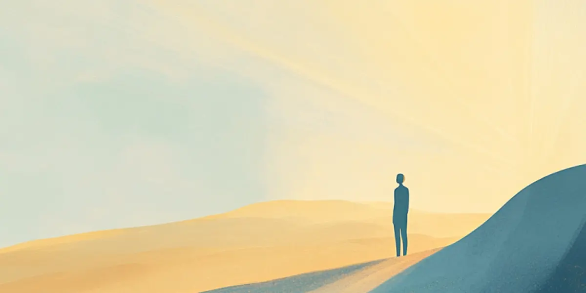 A lone figure stands atop a blue dune gazing toward a bright golden horizon across rolling hills.
